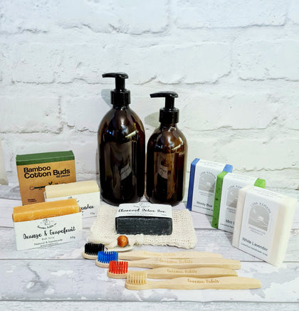 Eco-friendly Toiletries for personal car, natural soap bars, bamboo toothbrushes, bamboo cotton buds, soap saver and amber refillable glass jars